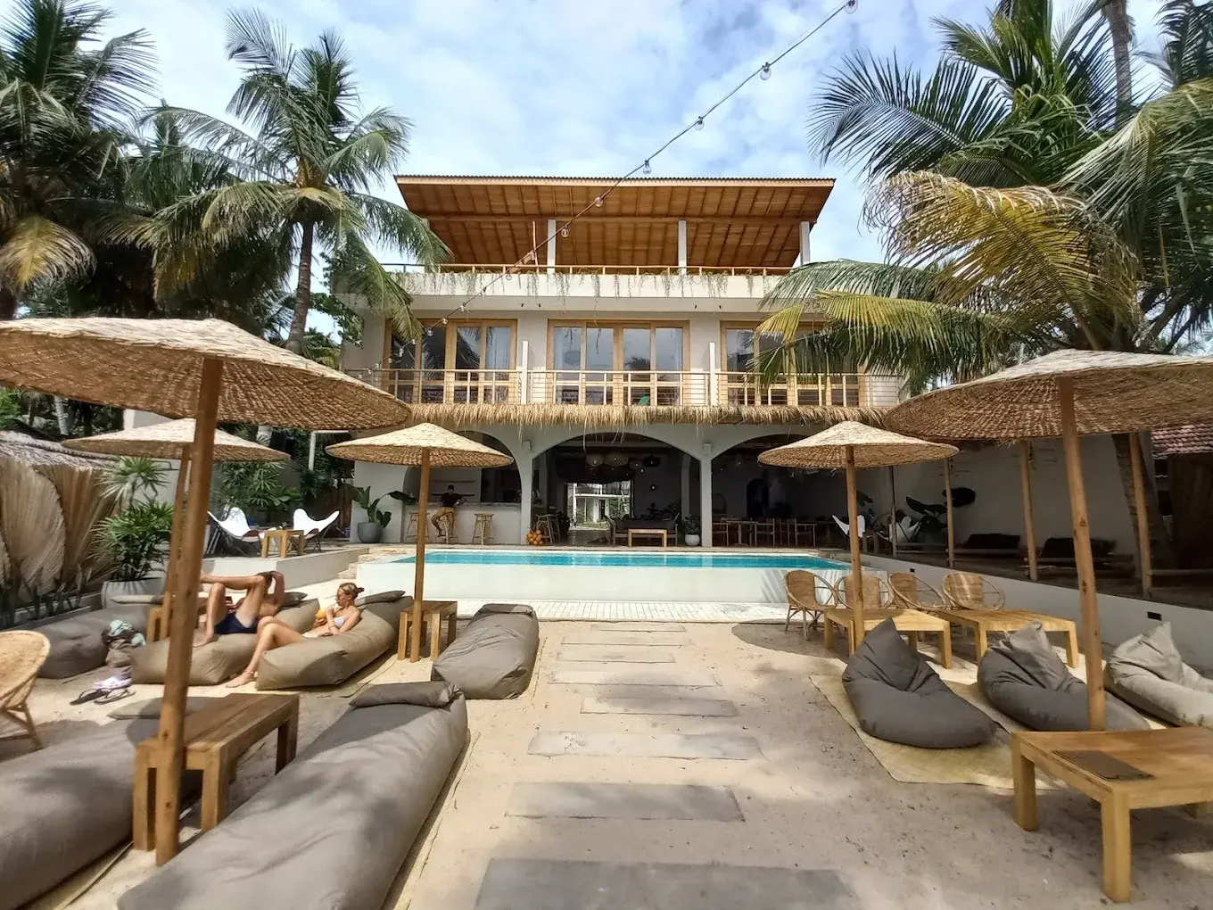 La Playa Hiriketiya beach club infinity pool, sunbeds, and ocean views — boutique hotel on Hiriketiya Beach, Dikwella, Sri Lanka