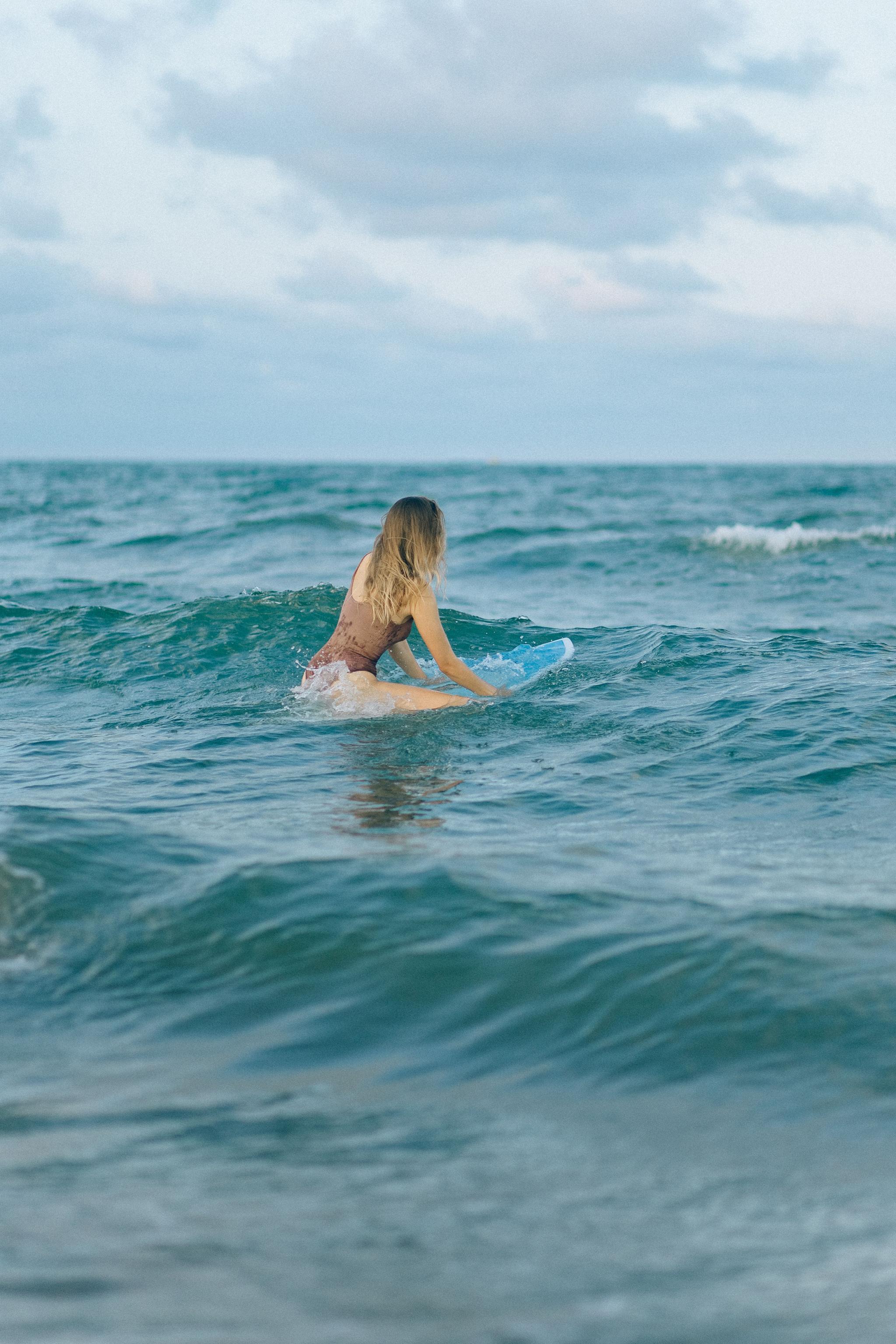 Girl enjoying Hiriketiya Beach