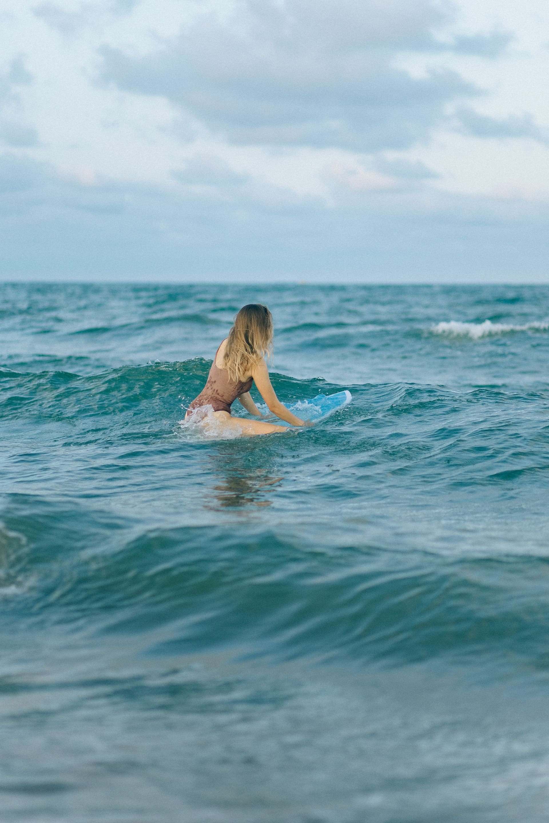 Girl enjoying Hiriketiya Beach