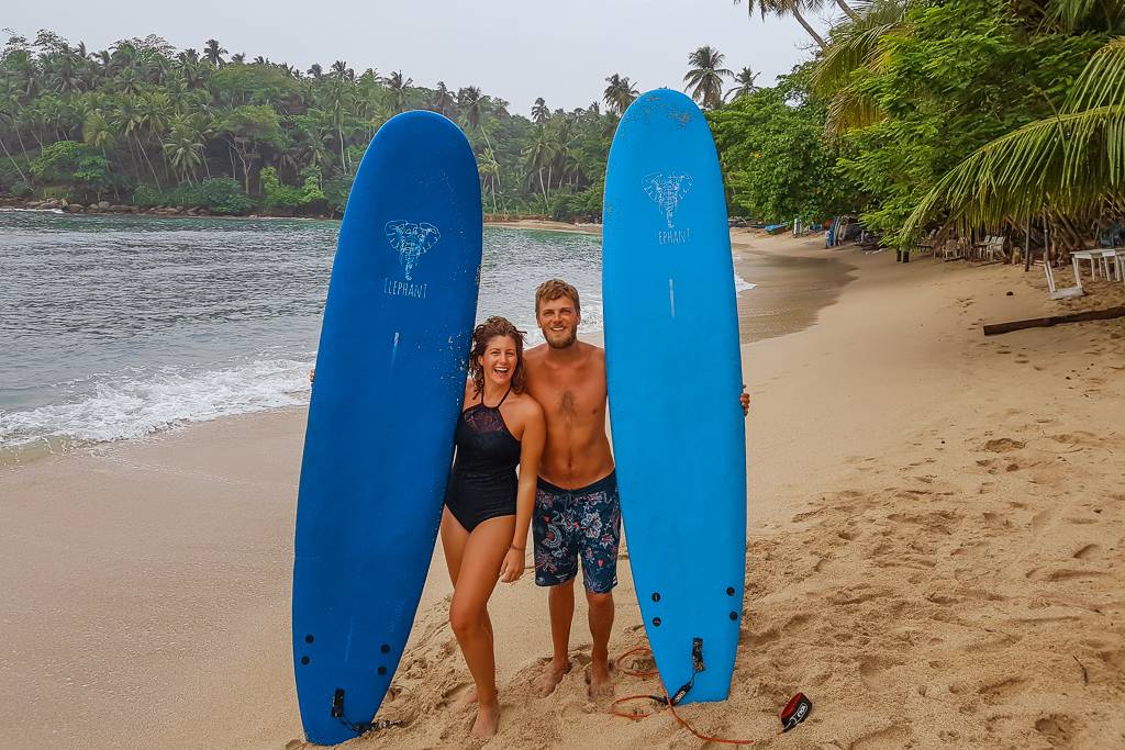 Hiriketiya Beach — lush palm trees meeting golden sand, south coast Sri Lanka